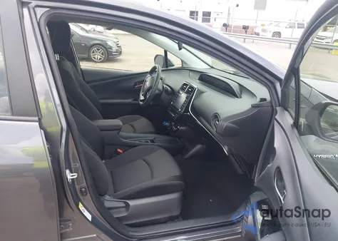 2021 Toyota Prius L Eco from USA, damaged, VIN JTDKAMFU3M3152785